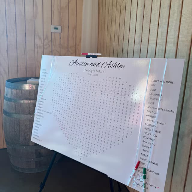 Customers gathered around their giant personalized puzzle at a celebration