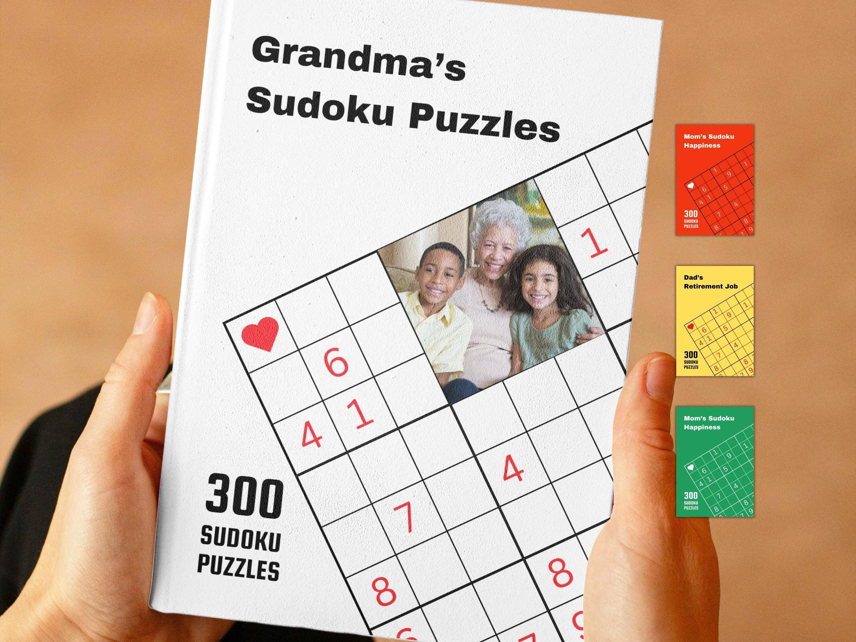 Hands holding white hardcover personalized teacher appreciation sudoku book with custom photo and 300 sudoku puzzles